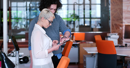 Image showing Business People Working With Tablet in office