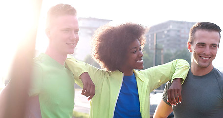 Image showing Portrait of multiethnic group of young people on the jogging