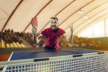 Image showing The table tennis player celebrating victory