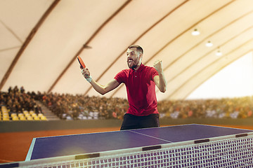 Image showing The table tennis player celebrating victory