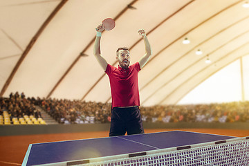 Image showing The table tennis player celebrating victory