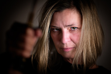 Image showing Female fighter with sword