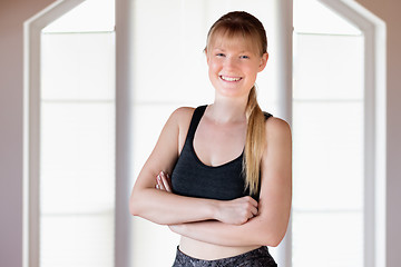 Image showing Girl doing squat exercises