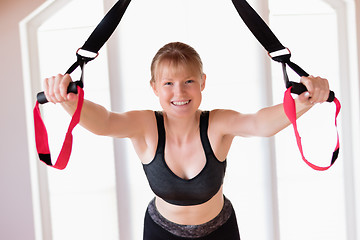 Image showing Girl in sling training