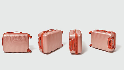 Image showing Brown modern stylish suitcases for a trip presented on a gray background with a copy space. Tourism concept