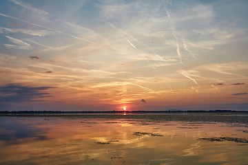 Image showing Sunset over a lake
