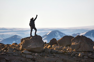 Image showing Standing on a cliff