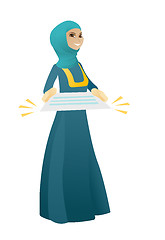 Image showing Muslim business woman holding a contract.