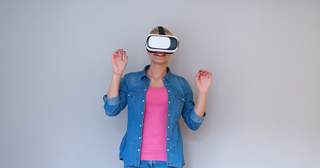 Image showing girl using VR headset glasses of virtual reality