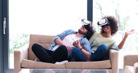 Image showing Multiethnic Couple using virtual reality headset