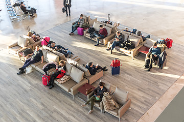 Image showing People waiting for their flight at departure terminal of Valencia Airport in Manises, also known as Manises Airport