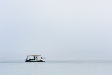 Image showing Two small fishing boat at sea surface