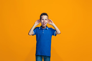 Image showing The squint eyed teen boy with weird expression