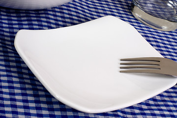 Image showing Empty plate on a dining table

