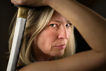 Image showing Female fighter with sword