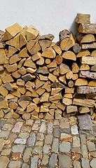 Image showing Firewood pile stacked chopped wood trunks