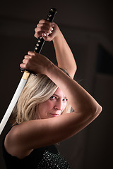 Image showing Female fighter with sword