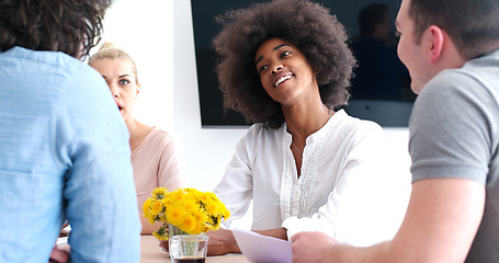 Image showing Multiethnic startup business team on meeting