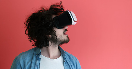 Image showing young man using VR headset glasses of virtual reality