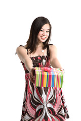 Image showing Asian woman giving gift