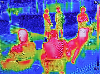 Image showing Infrared thermovision image showing when People sit at the table