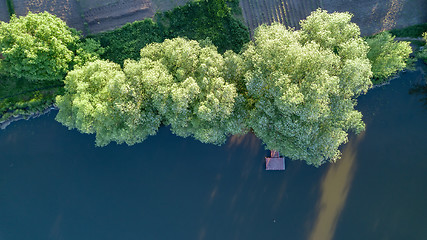 Image showing Aerial view of lakes, bridge and green forests district