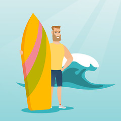 Image showing Young caucasian surfer holding a surfboard.