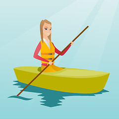 Image showing Young caucasian woman travelling by kayak.