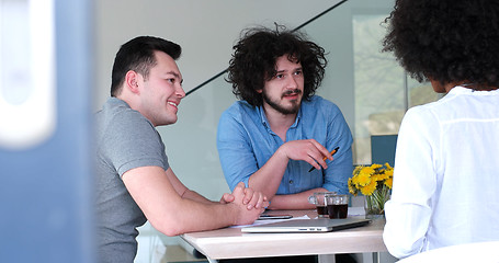 Image showing Multiethnic startup business team on meeting