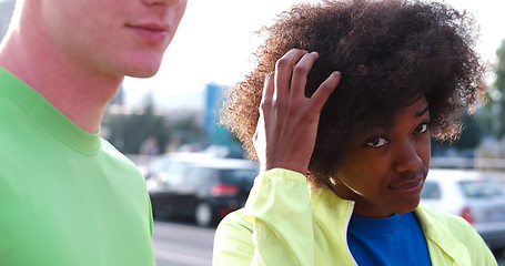 Image showing Portrait of multiethnic group of young people on the jogging