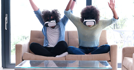 Image showing Multiethnic Couple using virtual reality headset