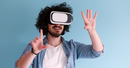 Image showing man using VR headset glasses of virtual reality