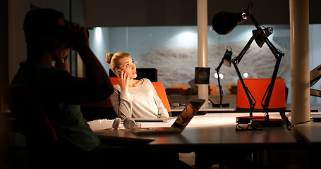 Image showing young designers in the night office