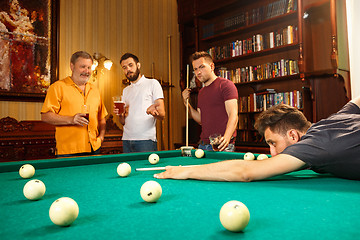 Image showing Close-up shot of a man playing billiard