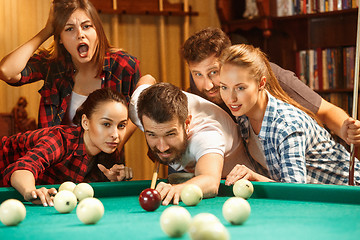 Image showing Close-up shot of a man playing billiard