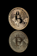 Image showing Gold Bitcoin Coin on black background.