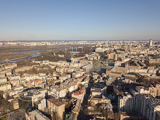 Image showing Aerial view of the city center of Kiev and Hydropark against the blue sky on a sunny day