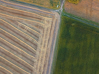 Image showing View from the height of a bird\'s flight from flying drones to agricultural fields, prepared for sowing crops.