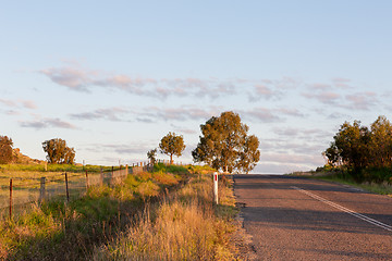 Image showing Sunny road in rural countryside