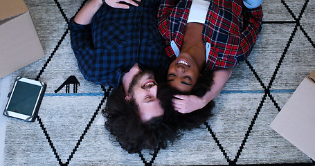 Image showing Top view of attractive young multiethnic couple