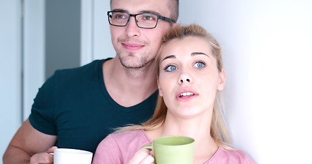 Image showing young couple enjoying morning coffee