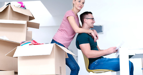 Image showing Young couple moving in a new home