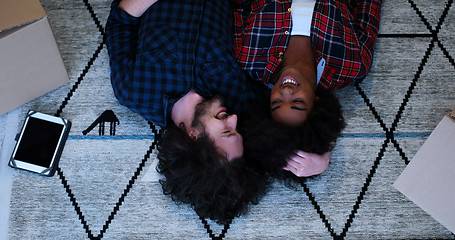 Image showing Top view of attractive young multiethnic couple