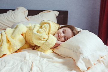 Image showing The child little girl sleeping in the bed