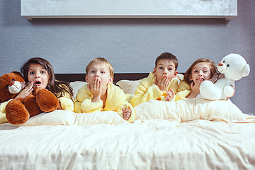 Image showing The group of friends taking goog time on bed