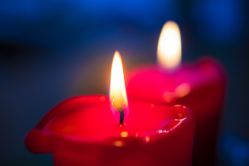 Image showing Two red burning candels 