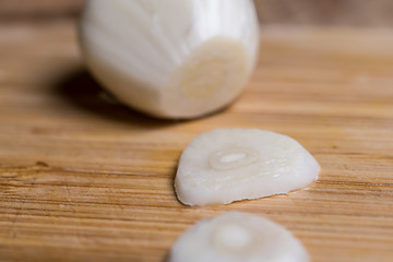 Image showing Closeup of a sliced garlic glove