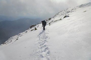 Image showing Mountain hiking in snow