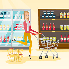 Image showing Caucasian woman running with trolley in the store.