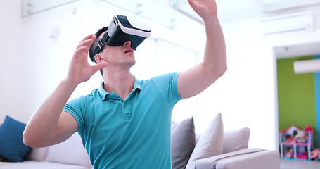 Image showing man using VR-headset glasses of virtual reality